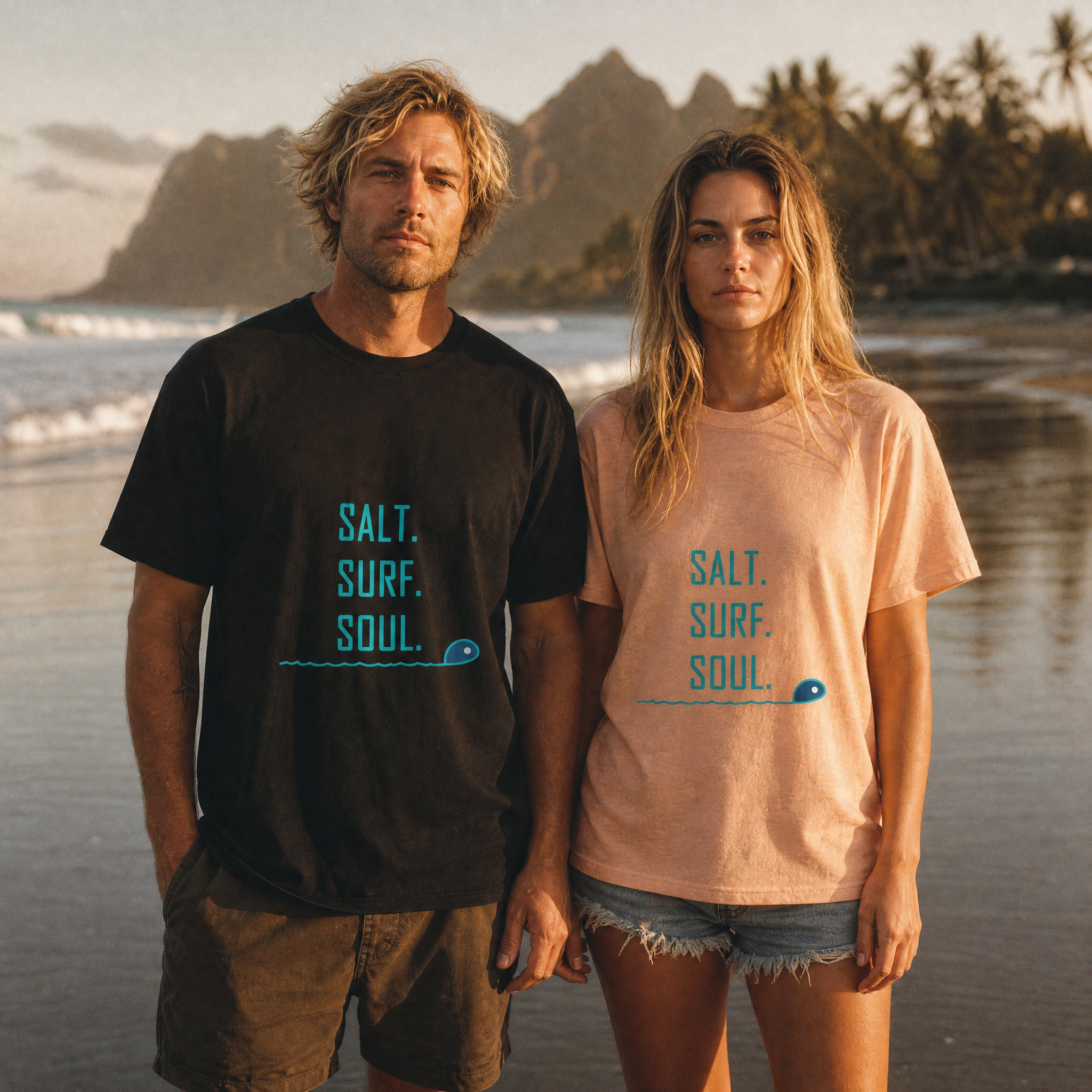 Salt. Surf. Soul. Unisex Tee worn by a man in Black and a woman in Heather Peach on the beach | NOFXGVN